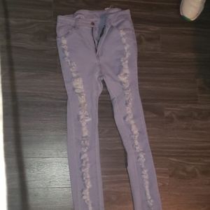 Ripped light blue jeans